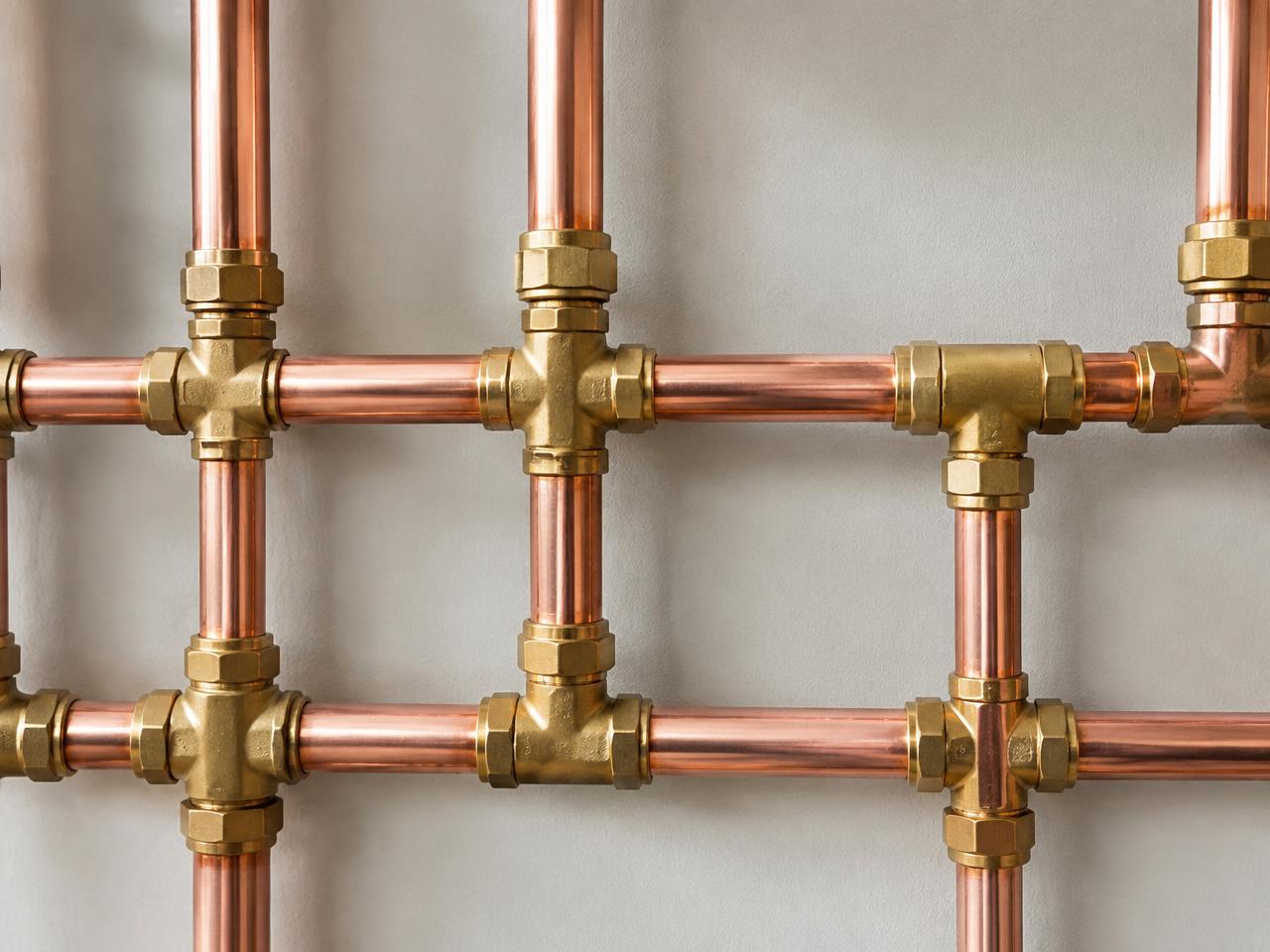 Copper plumbing pipes and brass fittings
